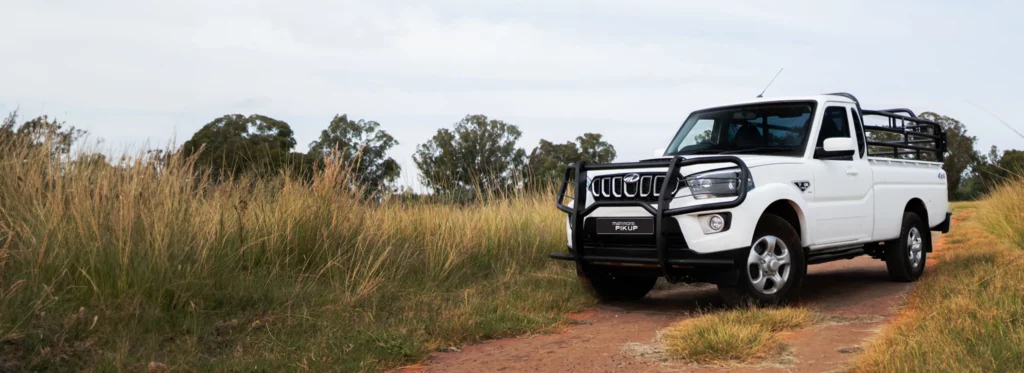 Mahindra 4x4 Double Cab Bakkie parked on dirt road